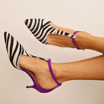 CHIARA - Elegant zebra print décolleté with stylish purple heel